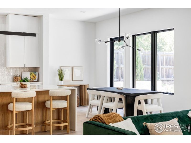 This new-construction home's numerous upgrades include a net-zero solar system, smart whole-house security system and garage door opener, programmable landscape sprinklers, an Electrolux washer-dryer and a two-car attached garage.