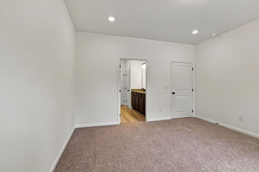 These pictures are of another unit of the same floor plan. Design selections will vary.