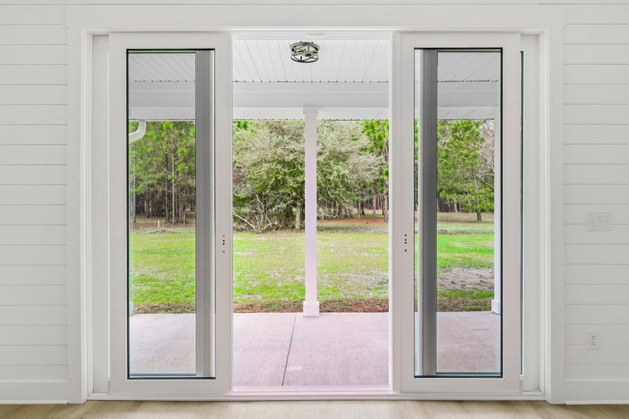 Exterior details and patio area of a home in , Johns Island (Image 31).