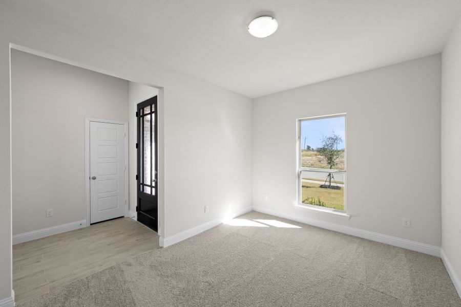 Front exterior of a new home in Still Water Lake, Godley, TX, highlighting curb appeal (Image 5). Front exterior of a new home in Still Water Lake, Godley, TX, highlighting curb appeal (Image 5).