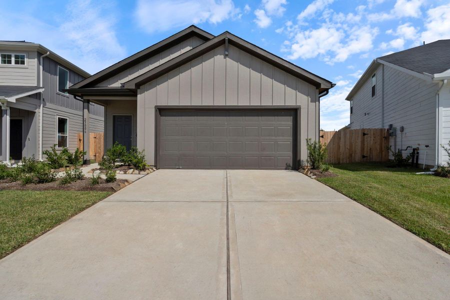 Front exterior of a new home in Stokesbury, Waller, TX, highlighting curb appeal (Image 12). Front exterior of a new home in Stokesbury, Waller, TX, highlighting curb appeal (Image 12).