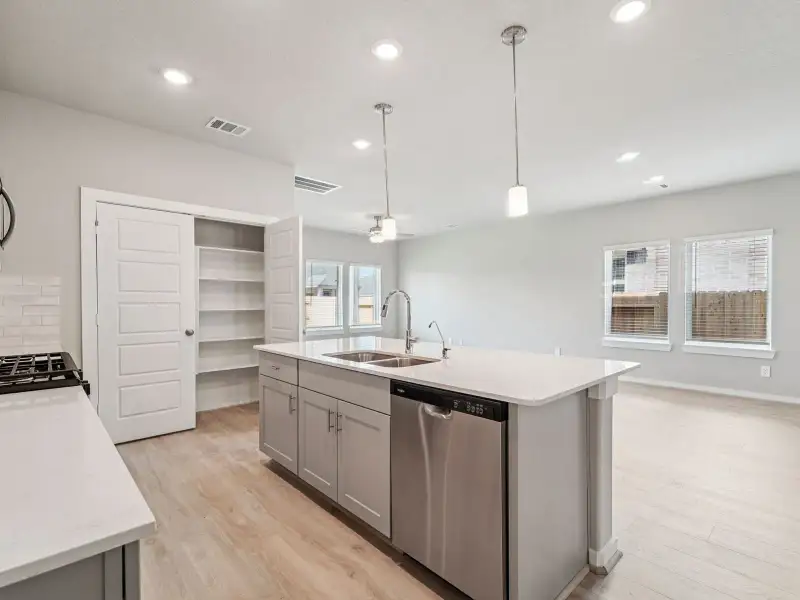 Furnished interior view inside a new home in Massey Oaks Village, Pearland (Image 3). Furnished interior view inside a new home in Massey Oaks Village, Pearland (Image 3).