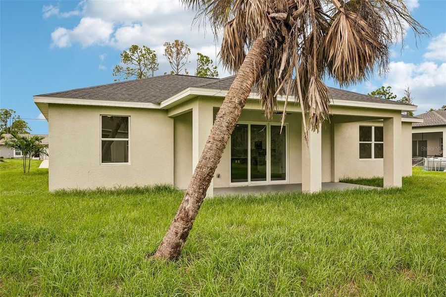 Exterior details and patio area of a home in , North Port (Image 4).