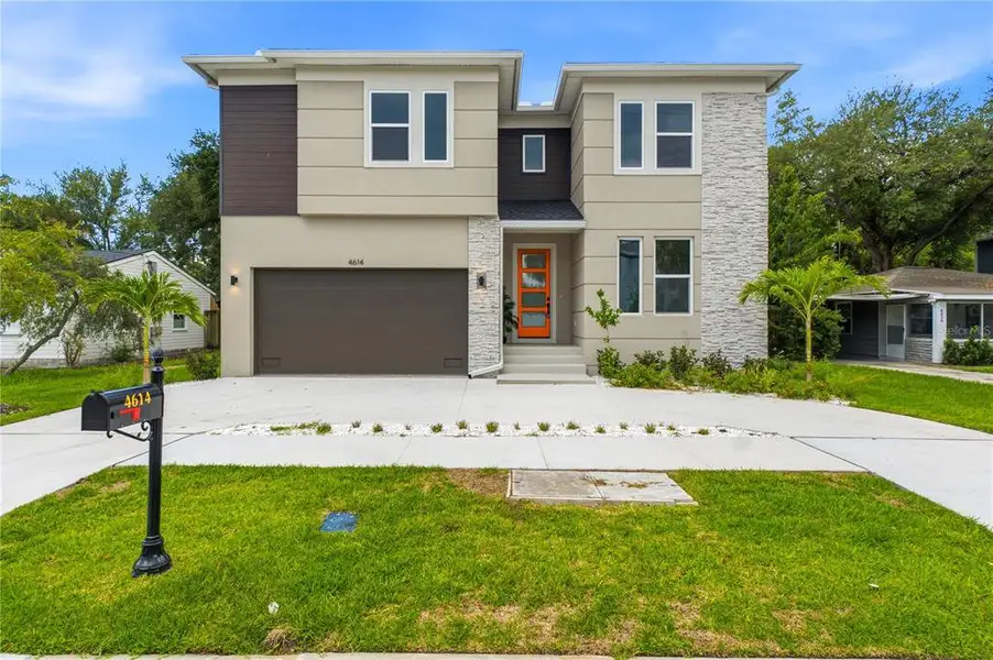Front exterior of a new home in , Tampa, FL, highlighting curb appeal (Image 31).