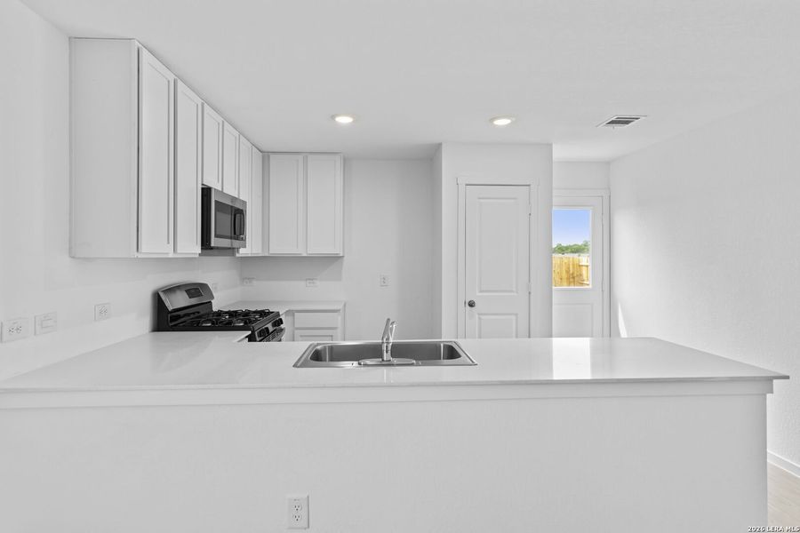 Furnished interior view inside a new home in Spring Grove, St. Hedwig (Image 6).