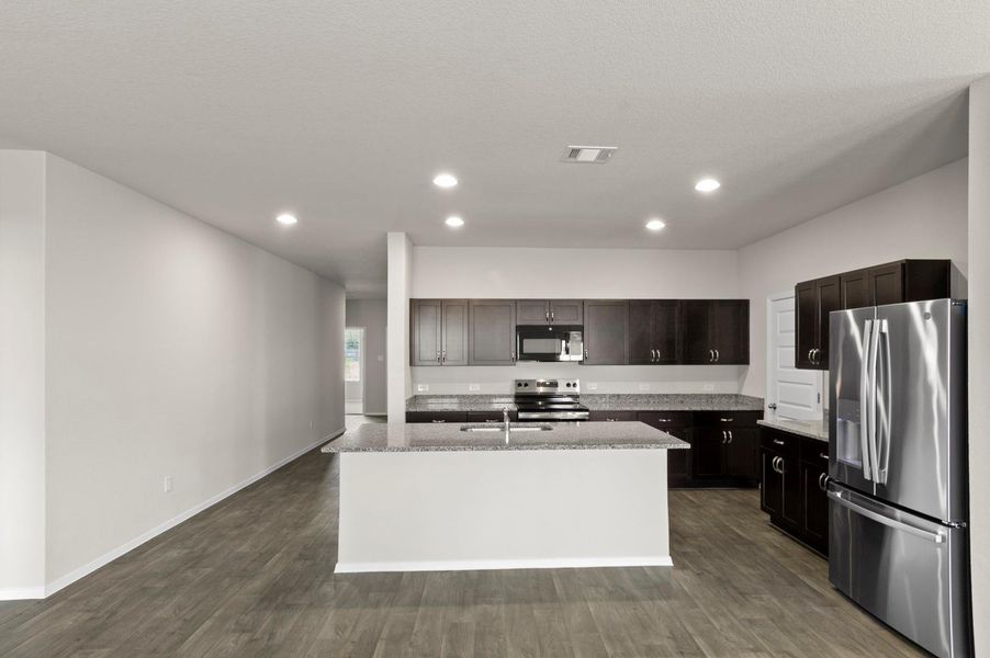 Furnished interior view inside a new home in Oaks at San Gabriel, Georgetown (Image 13).