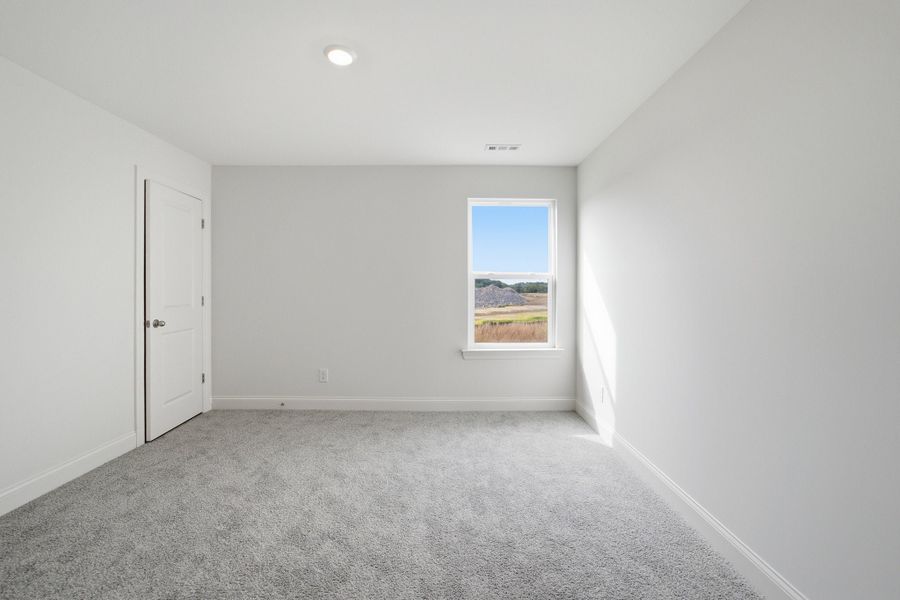 Spacious, unfurnished interior of a new home in McCain's Station, Gallatin (Image 37).