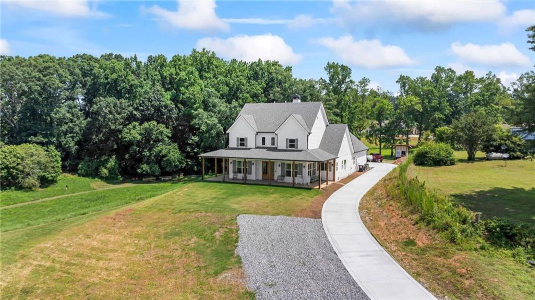 Front exterior of a new home in , Cumming, GA, highlighting curb appeal (Image 21).