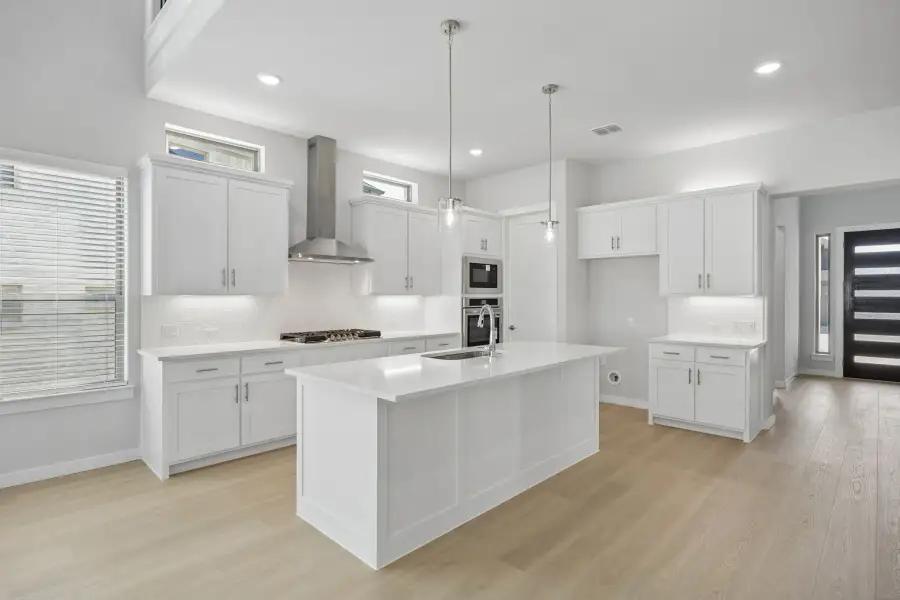 Kitchen in the Monet II home plan by Trophy Signature Homes – REPRESENTATIVE PHOTO Kitchen in the Monet II home plan by Trophy Signature Homes – REPRESENTATIVE PHOTO