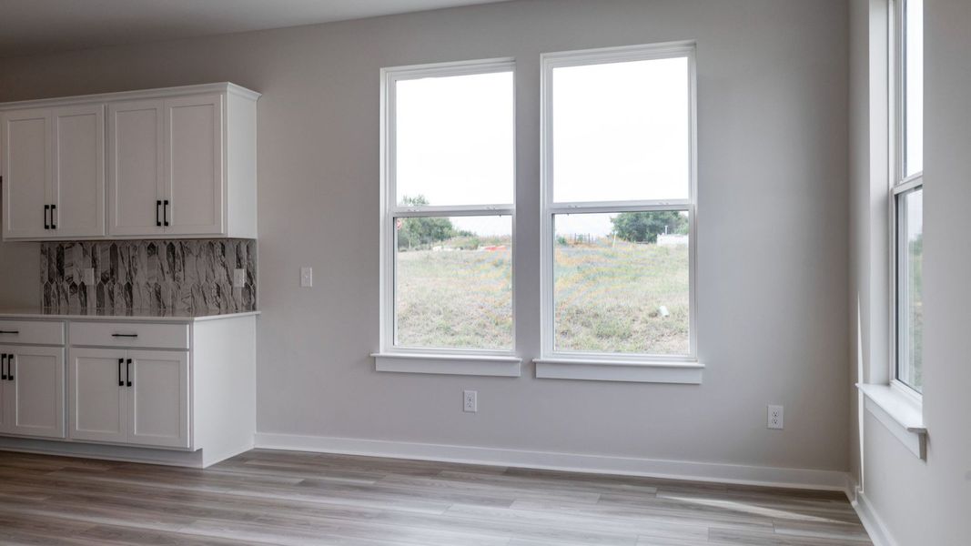 Possible dining area right next to kitchen for convenience