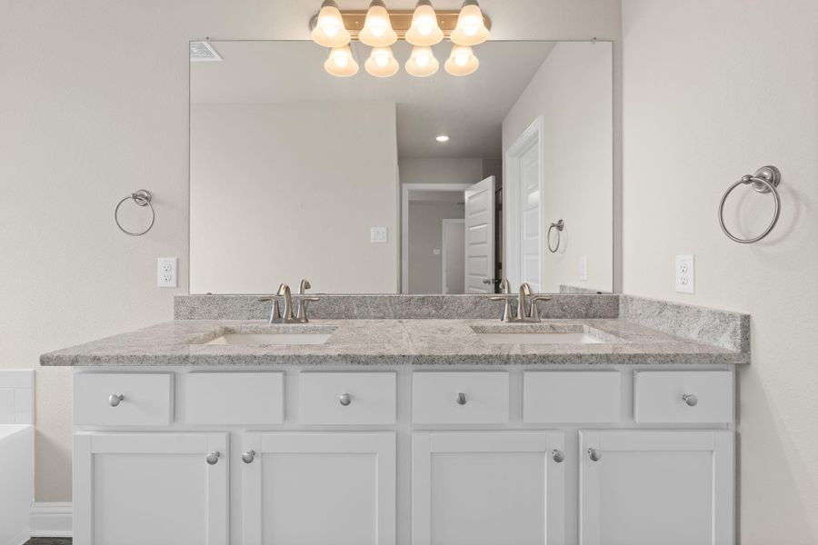 Furnished interior view inside a new home in Sunterra, Katy (Image 10).