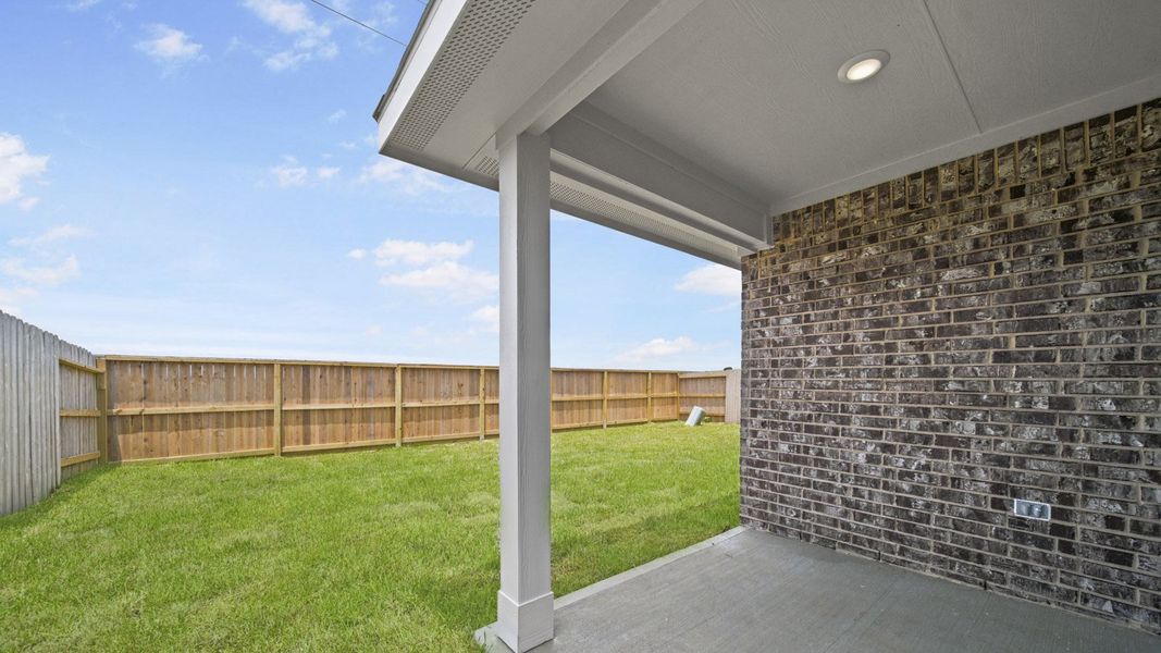 Exterior details and patio area of a home in Sunterra, Katy (Image 3).