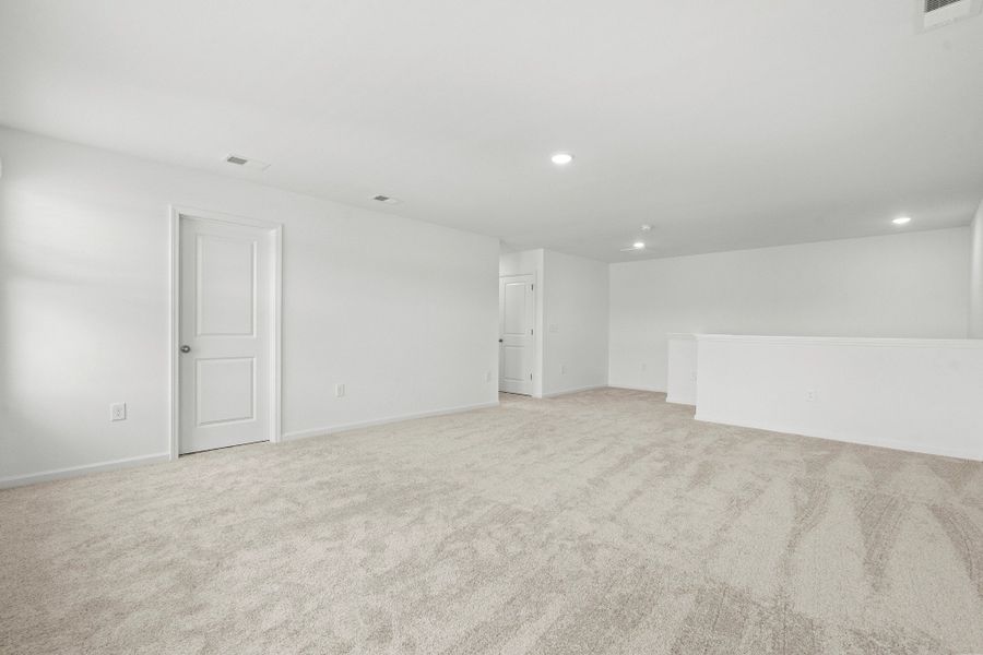 Representative unfurnished interior of a home built from the Sagan by Starlight Homes in Cottonwood Creek, San Marcos (Image 19).