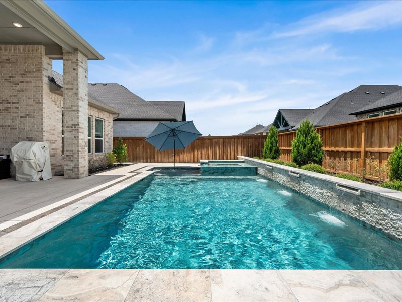 Exterior details and patio area of a home in , Spring (Image 24).