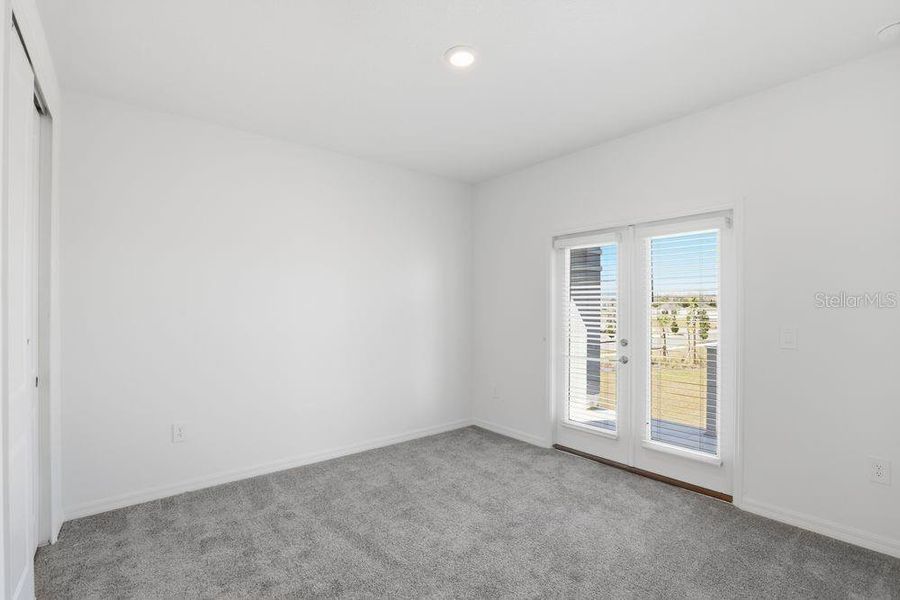 Spacious, unfurnished interior of a new home in Harvest at Ovation, Winter Garden (Image 14).