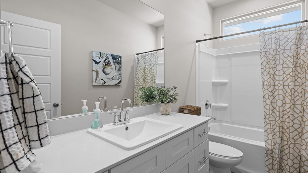 Furnished interior view inside a new home in Mustang Ridge, Andrews (Image 17).