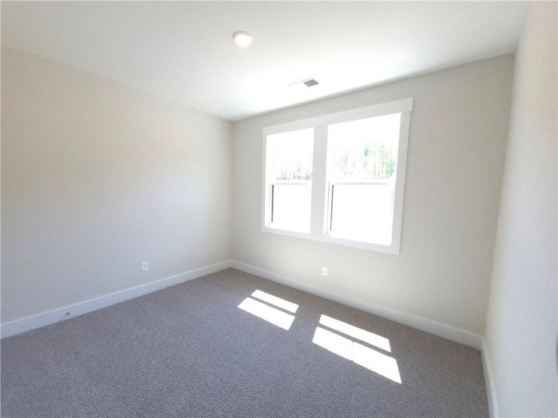 Spacious, unfurnished interior of a new home in Saratoga Oaks, Williamston (Image 5).