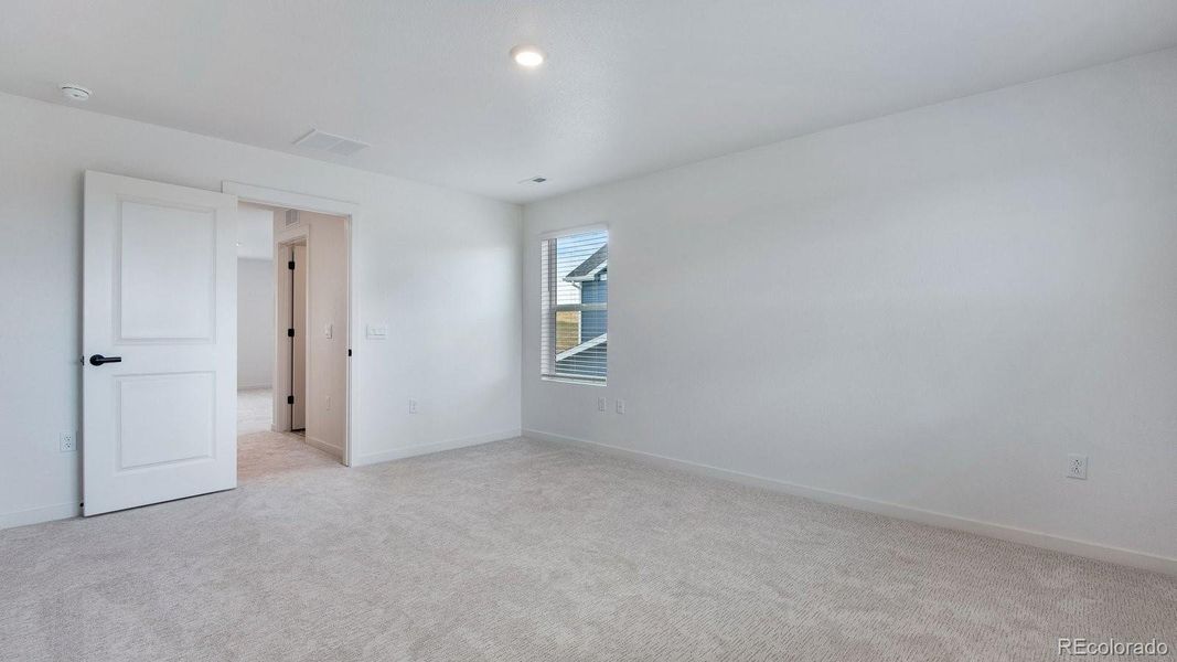 Spacious, unfurnished interior of a new home in Trails at Crowfoot, Parker (Image 14).