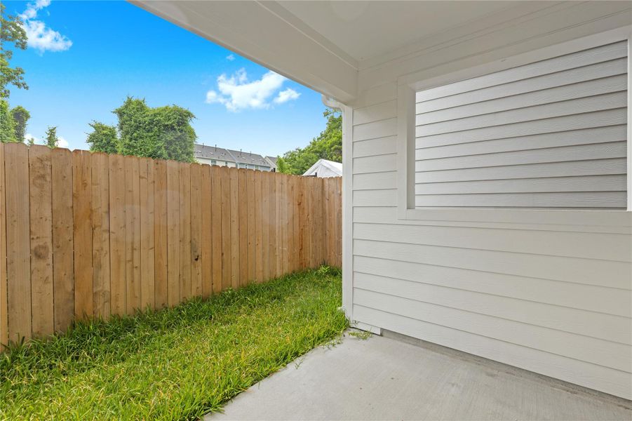Exterior details and patio area of a home in , Houston (Image 23).