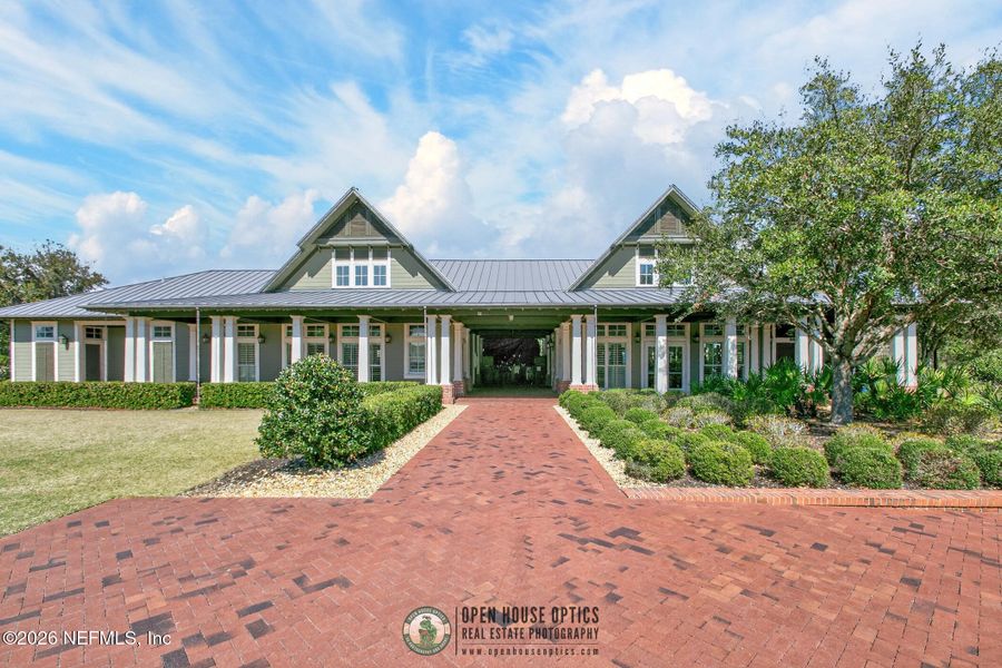 Front exterior of a new home in , St. Johns, FL, highlighting curb appeal (Image 27).