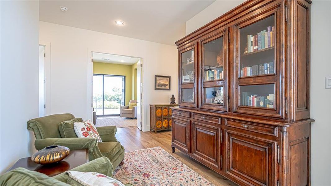 Sitting room featuring light hardwood / wood-style flooring