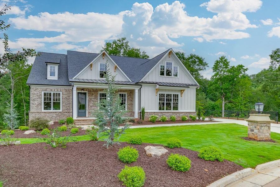 Front exterior of a new home in , Cumming, GA, highlighting curb appeal (Image 2). Front exterior of a new home in , Cumming, GA, highlighting curb appeal (Image 2).