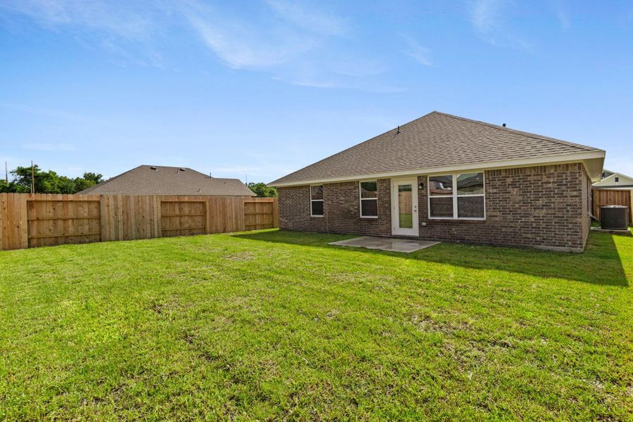 Exterior details and patio area of a home in River Ranch Trails, Dayton (Image 3).