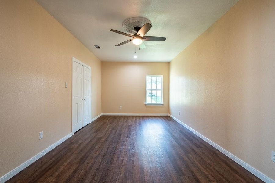 Oversized space for the primary bedroom which features a walk in closet and an en suite.