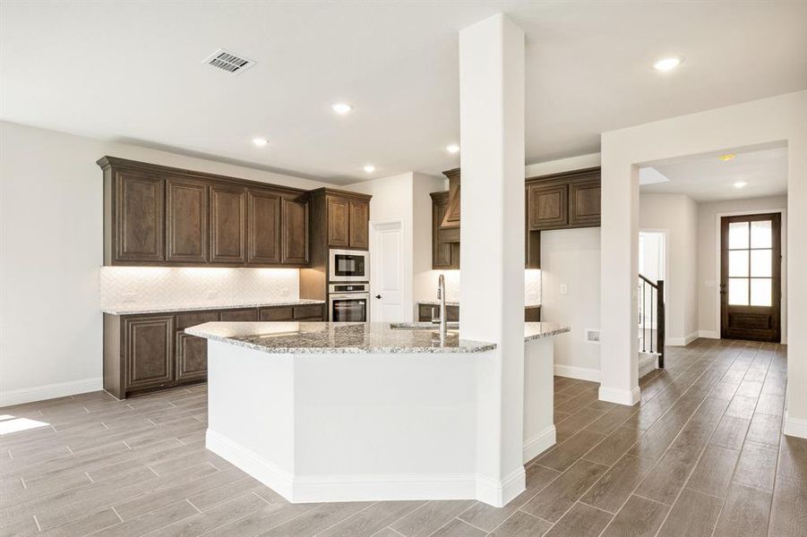 Furnished interior view inside a new home in Mockingbird Hills 60-65, Joshua (Image 17). Furnished interior view inside a new home in Mockingbird Hills 60-65, Joshua (Image 17).