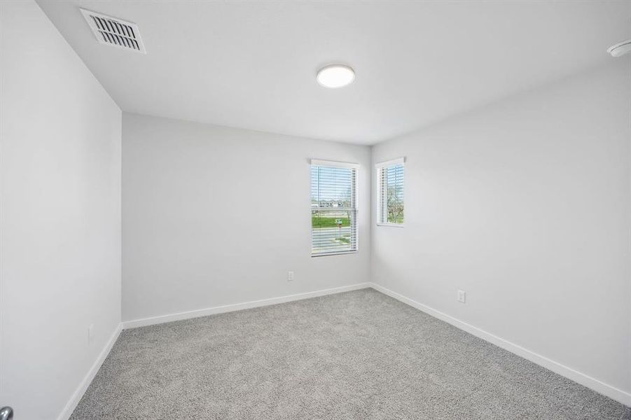 Bedroom in the Mesquite home plan by Trophy Signature Homes – REPRESENTATIVE PHOTO