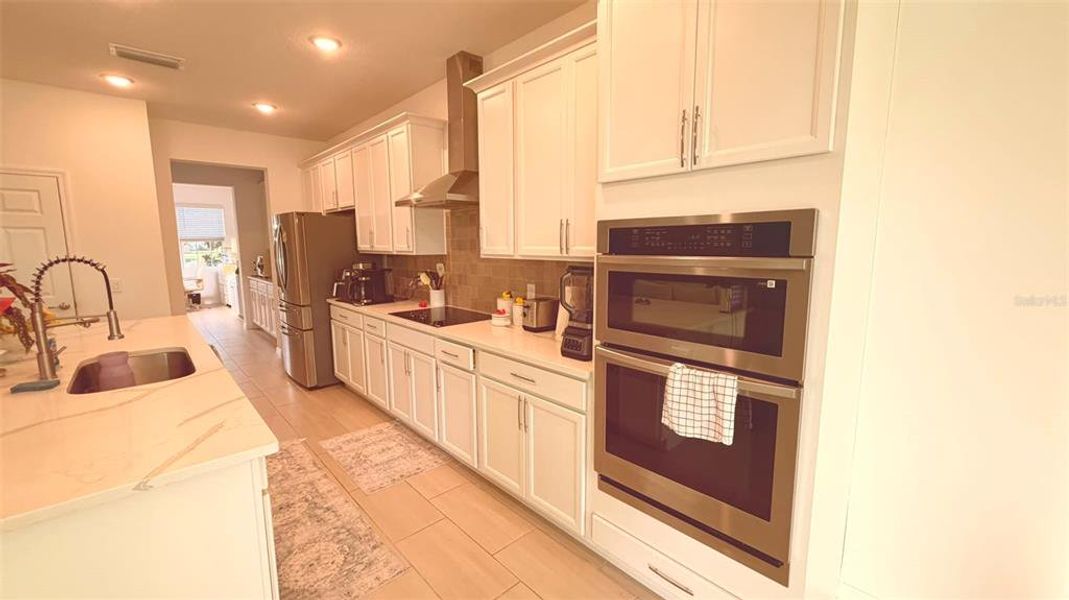 Furnished interior view inside a new home in , Kissimmee (Image 12).