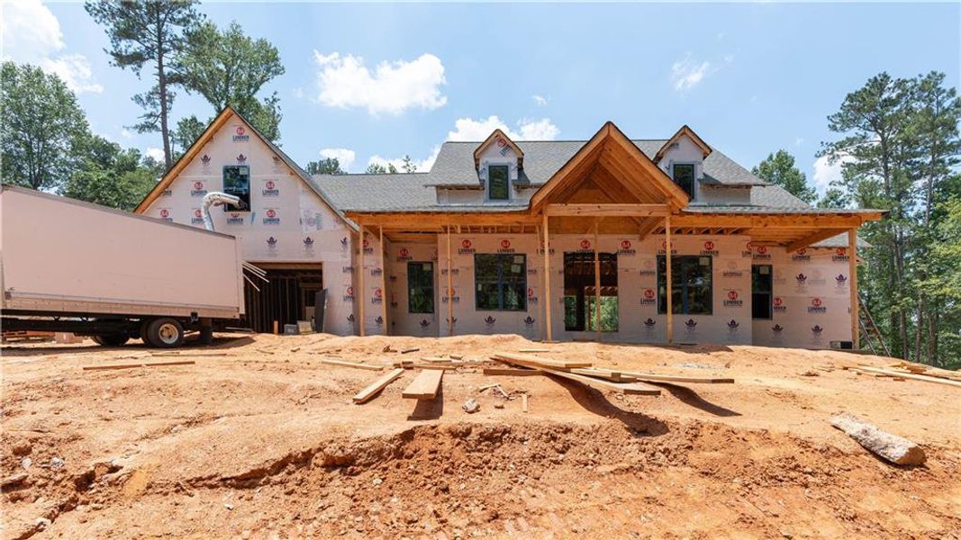 Front exterior of a new home in , Carrollton, GA, highlighting curb appeal (Image 26).