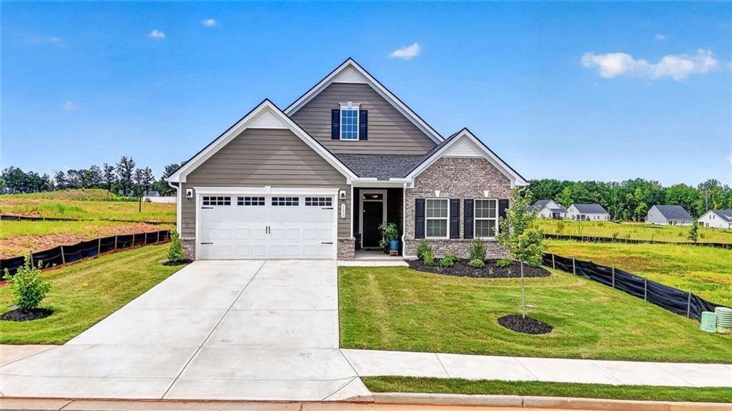 Front exterior of a new home in , McDonough, GA, highlighting curb appeal (Image 25). Front exterior of a new home in , McDonough, GA, highlighting curb appeal (Image 25).