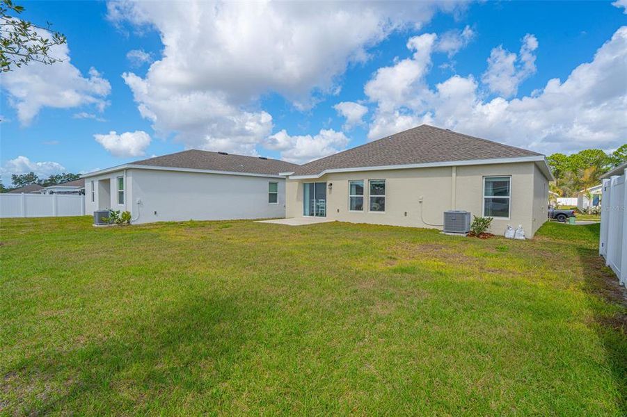 Exterior details and patio area of a home in Vineland Reserve, Osteen (Image 3).
