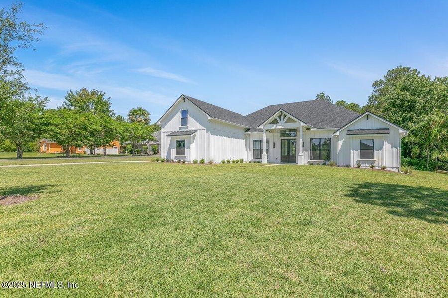 Front exterior of a new home in , Jacksonville, FL, highlighting curb appeal (Image 2).