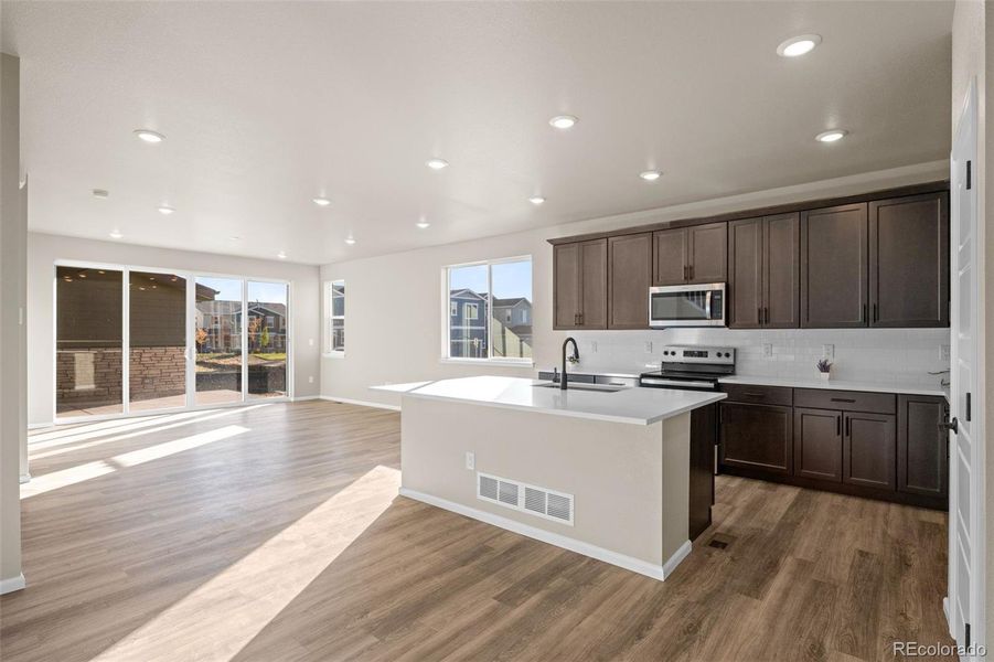 Furnished interior view inside a new home in Painted Prairie, Aurora (Image 8).