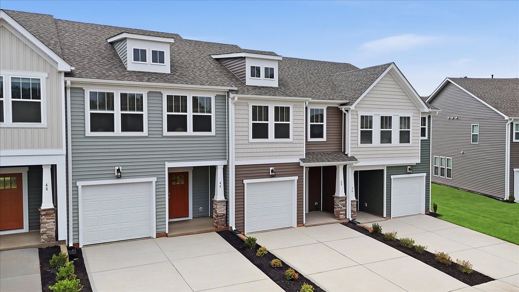 Exclusive DRB Homes exterior with balanced proportions and vibrant curb appeal