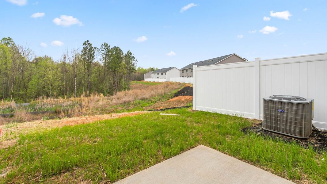 Exterior details and patio area of a home in Henley Ridge, Graham (Image 2).