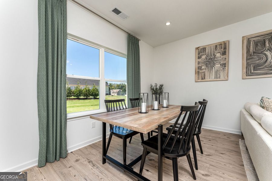 Furnished interior view inside a new home in Cobblestone Crossing Commons, Byron (Image 12).