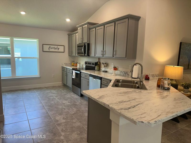 Furnished interior view inside a new home in Hickory Ridge, Cocoa, FL, Cocoa (Image 6). Furnished interior view inside a new home in Hickory Ridge, Cocoa, FL, Cocoa (Image 6).