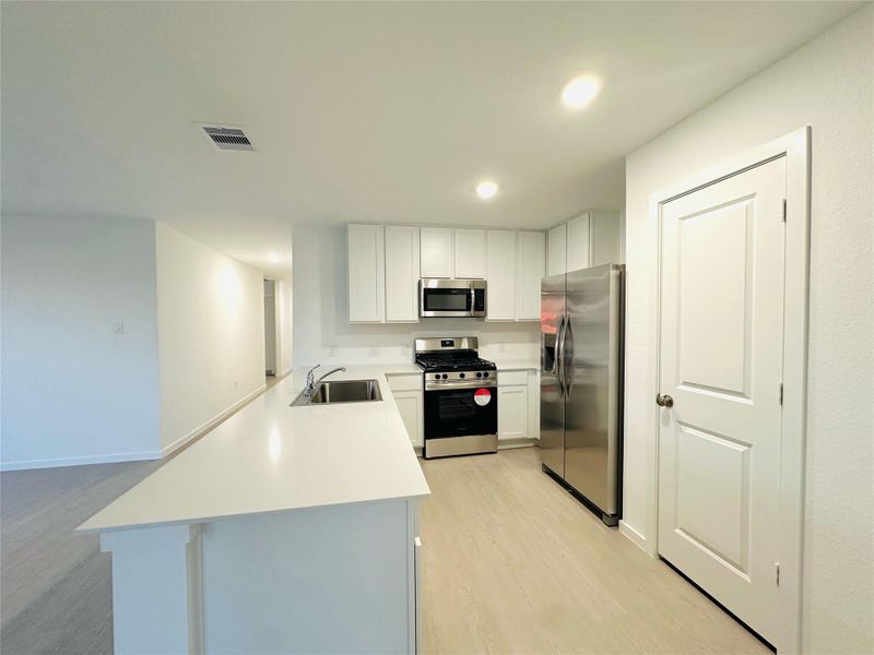 Furnished interior view inside a new home in Anniston, Katy (Image 4).