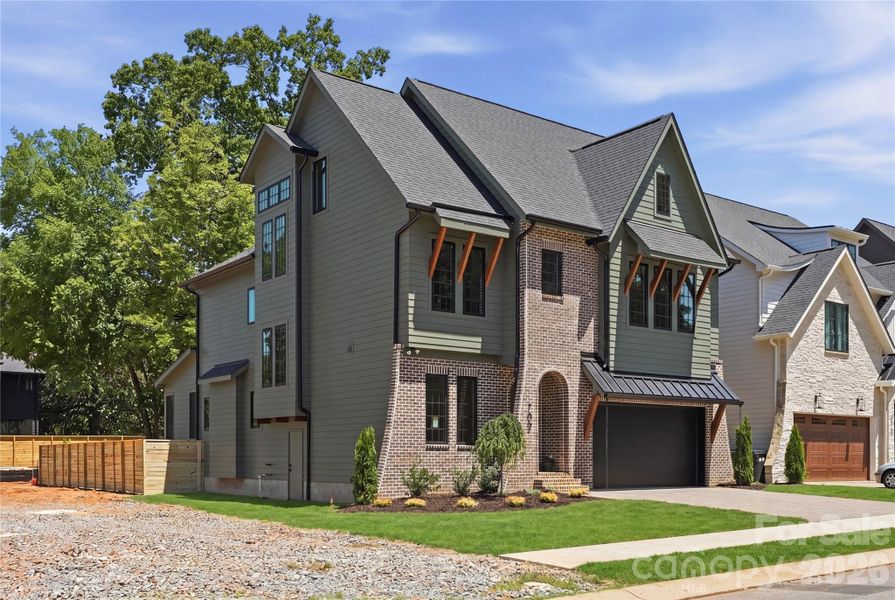 Front exterior of a new home in , Charlotte, NC, highlighting curb appeal (Image 25).