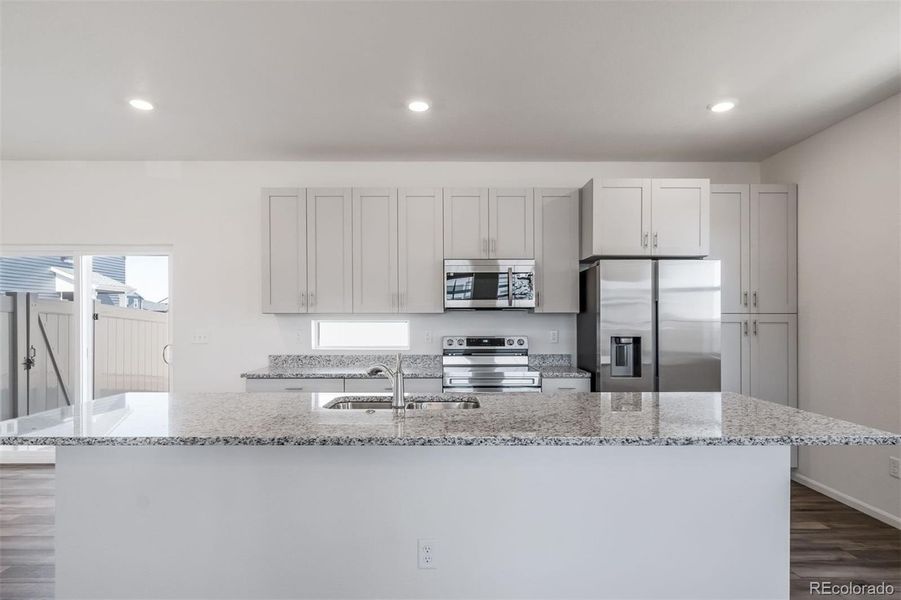 Furnished interior view inside a new home in Reunion, Commerce City (Image 9).