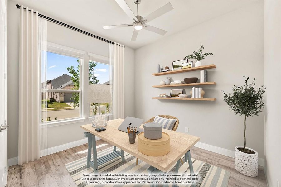 Home office with wood desk, ceiling fan, floating shelves, and large window with natural light Home office with wood desk, ceiling fan, floating shelves, and large window with natural light