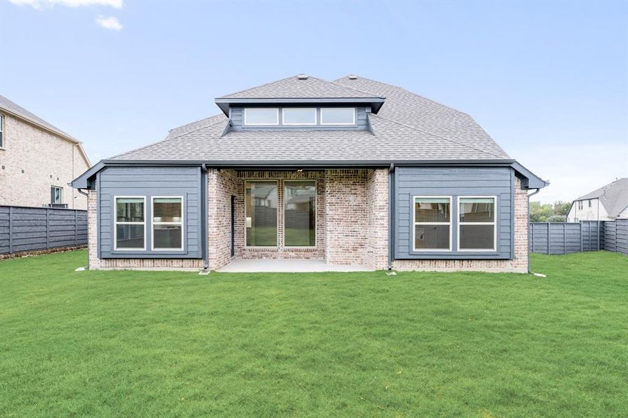 Exterior details and patio area of a home in Union Park Classic 55, Little Elm (Image 16).