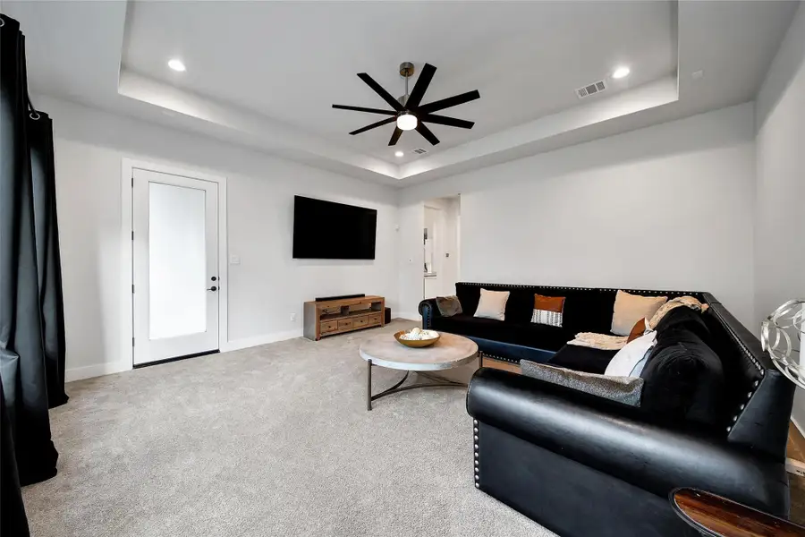 Furnished interior view inside a new home in ARTAVIA, Conroe (Image 34).
