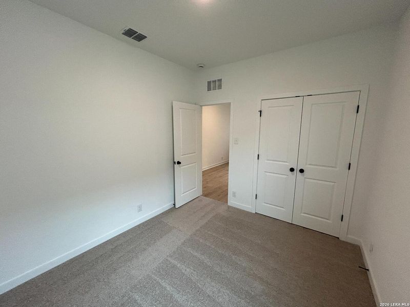 Spacious, unfurnished interior of a new home in Hennersby Hollow, San Antonio (Image 23).