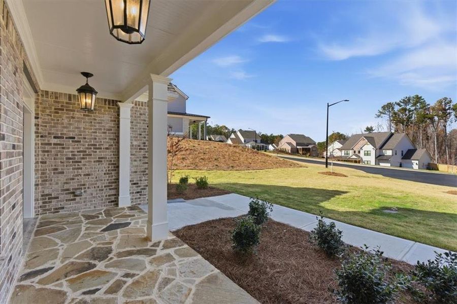 Exterior details and patio area of a home in Ford Landing, Acworth (Image 31).