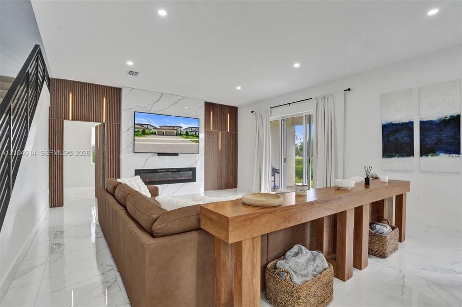 Recessed lighting illuminates the white tile flooring