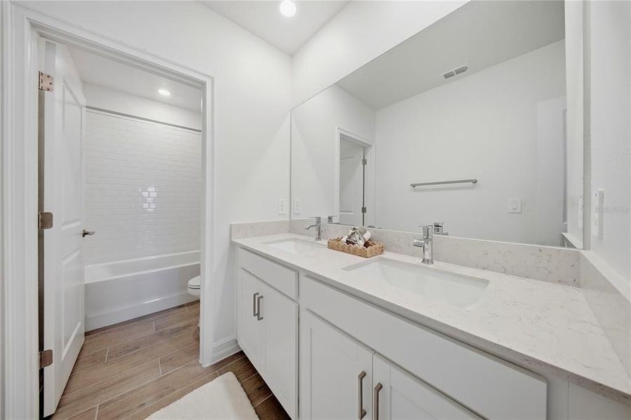 Furnished interior view inside a new home in Connerton, Land O' Lakes (Image 56).
